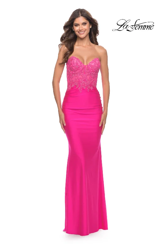 geometric print prom dressesLa Femme Strapless Neon Pink Prom Dress with Lace